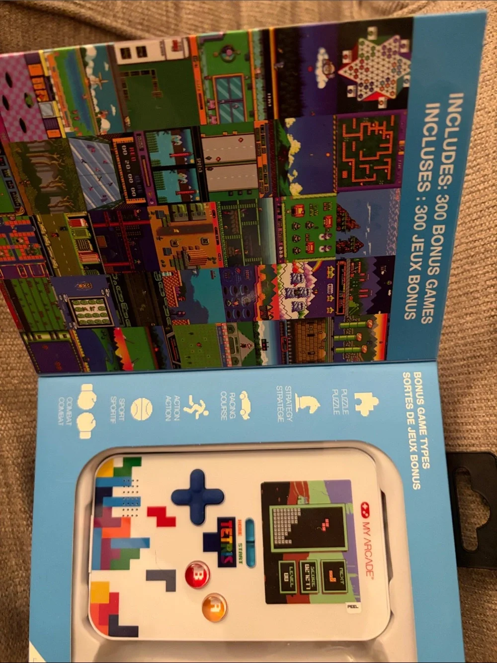 Arcade White Tetris Portable Gaming System with Colorful Tetris Accents